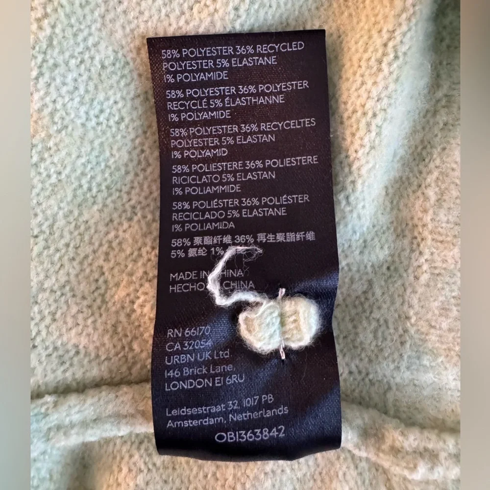Anthropologie Pistachio oversized ribbed sleeve Sweater. Size M GUC.